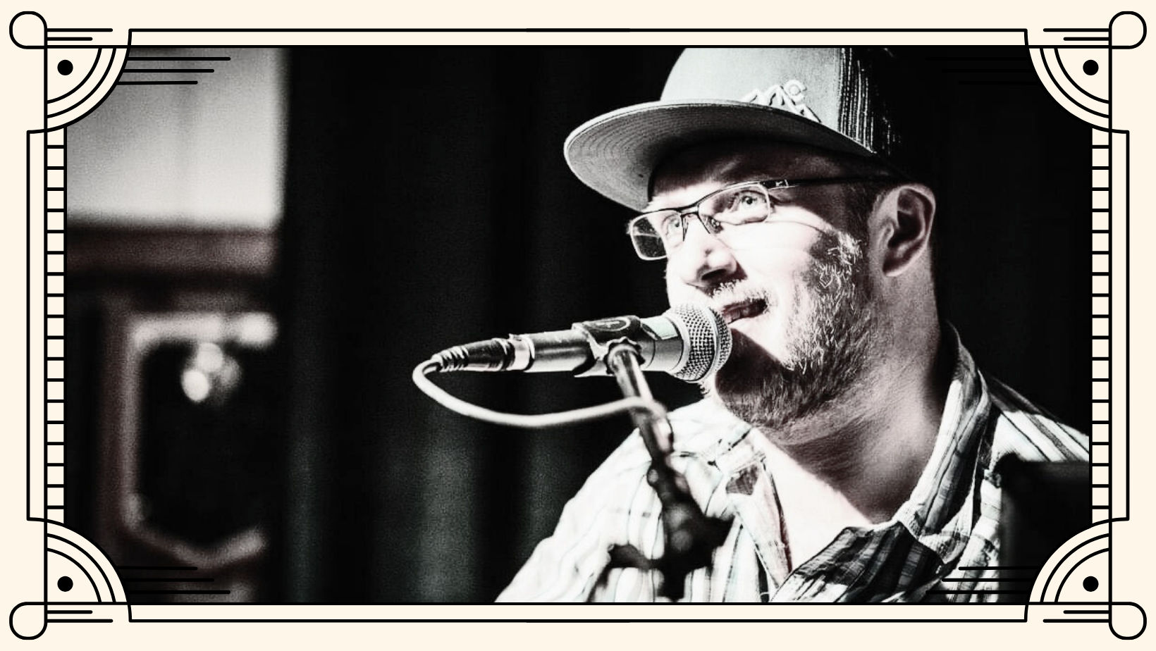 Musician Brian McCosky perfoming on stage.