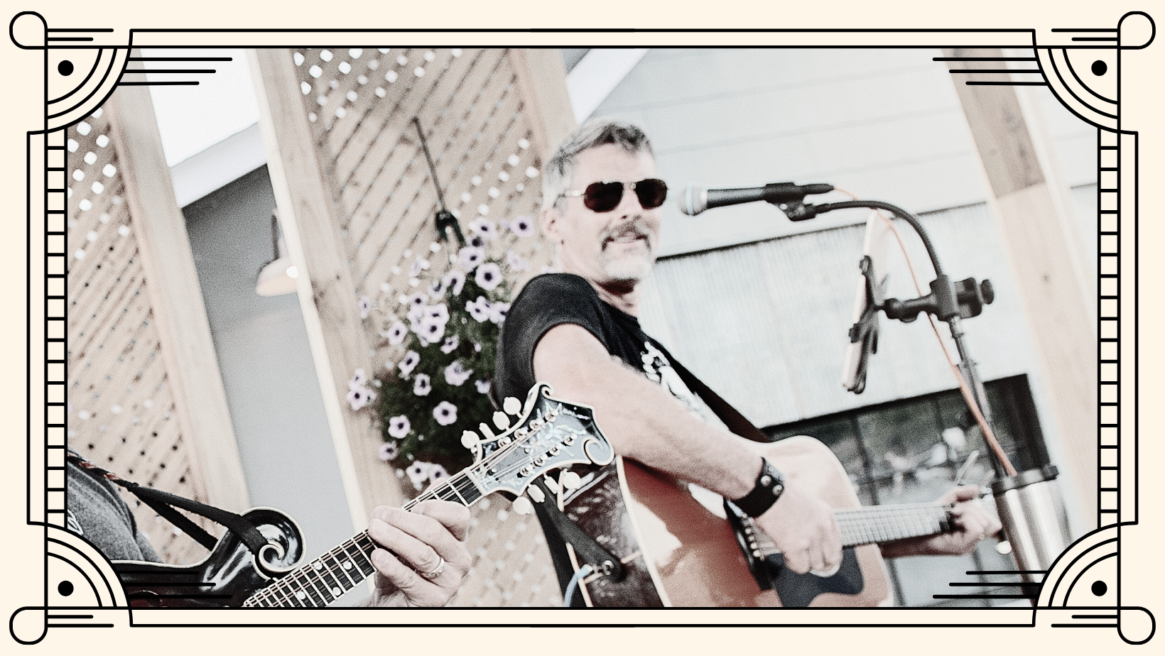 Musician Dane Tollas performing on the amphitheater stage at Lavender Hill Farm.