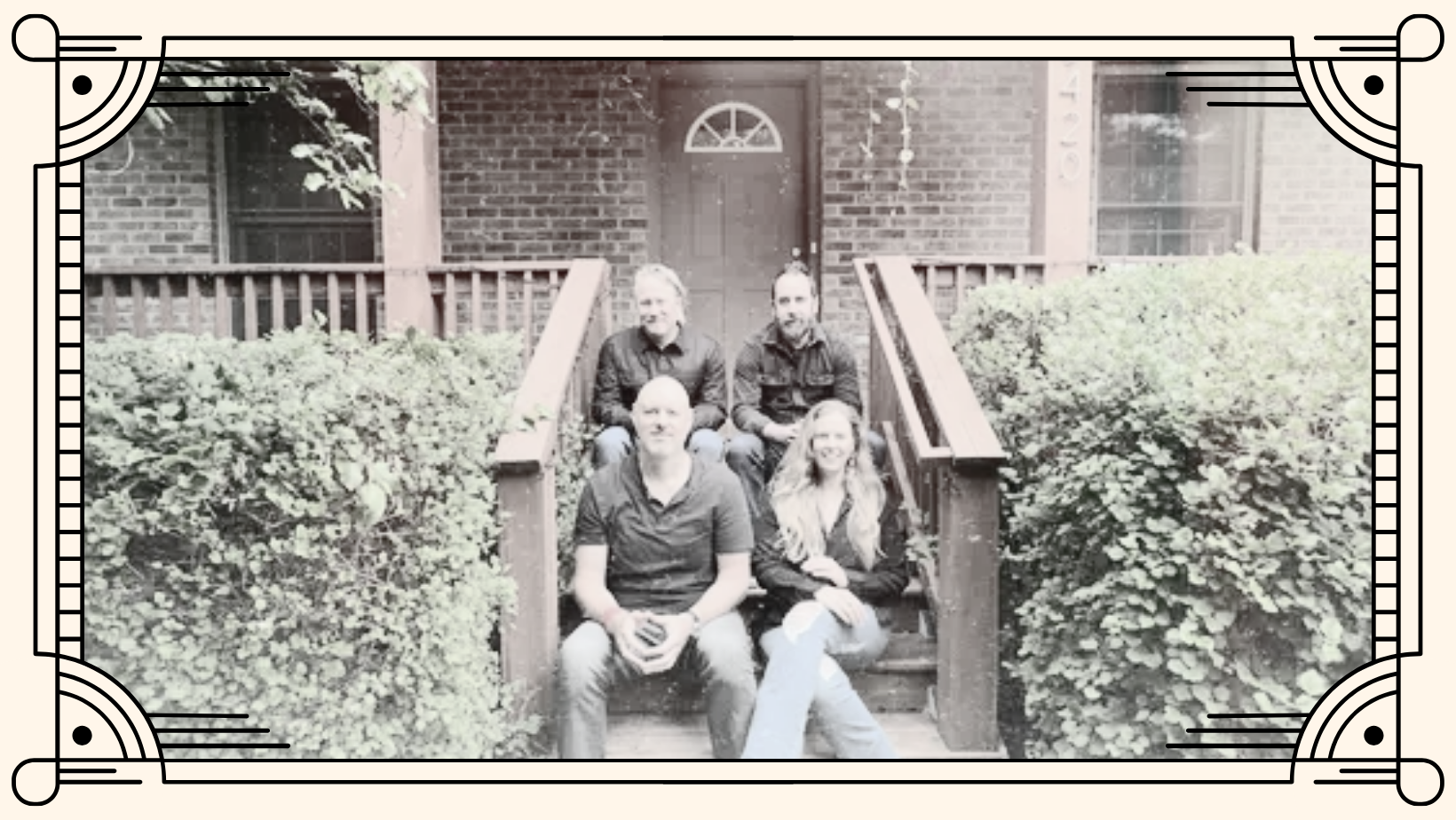 The band, Lucky 17 sitting on the steps of a porch.