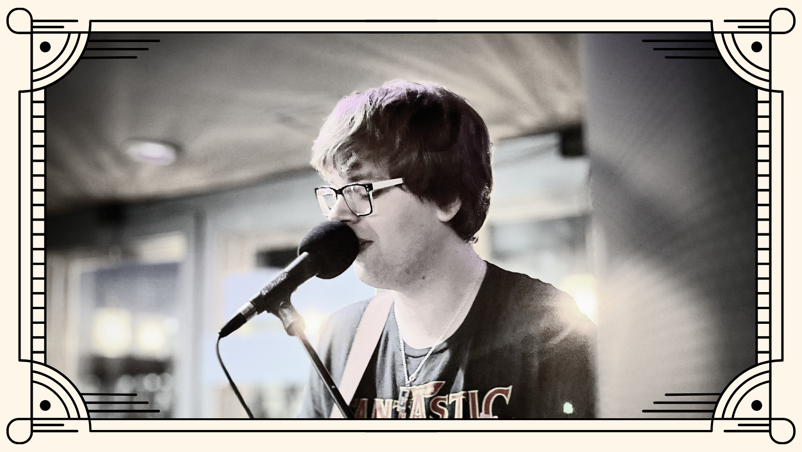 Musician Ryan Cassidy performing on stage.